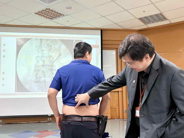 男腰椎滑脫痛如針刺 早微創午出院1