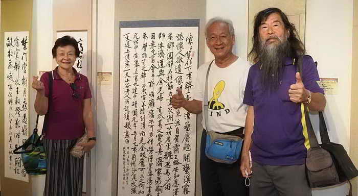 雲林縣書法學會113年會員暨邀請名家聯展及李郁周書法縱橫談 深受讚美1